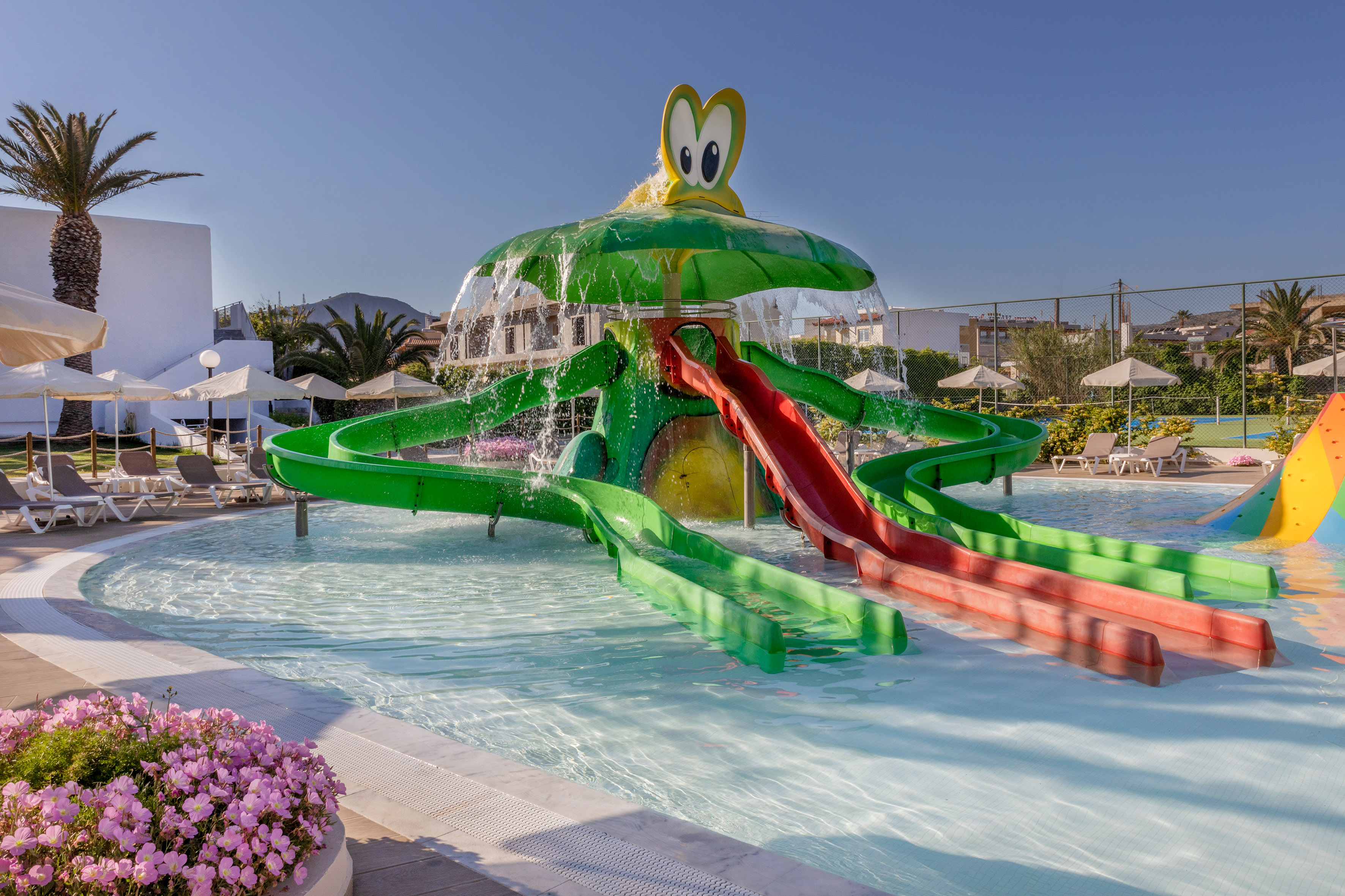 a water slide in a pool