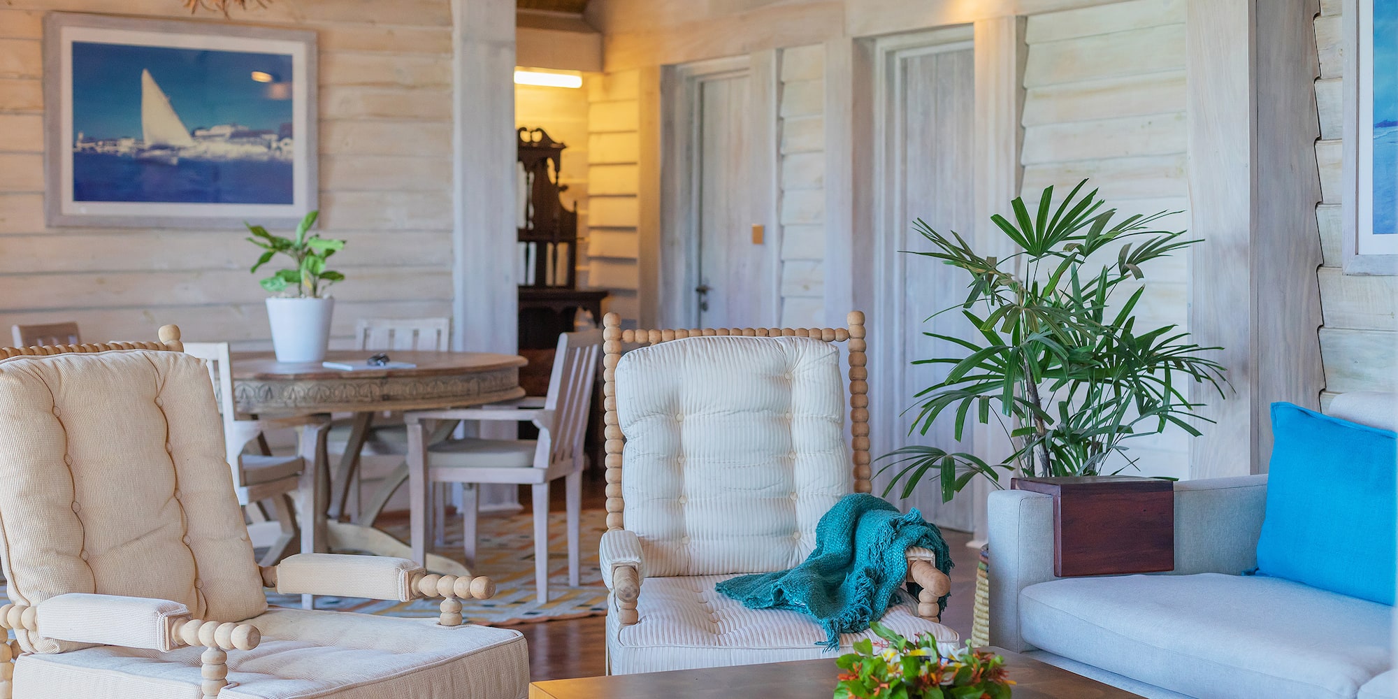 a room with chairs and a table