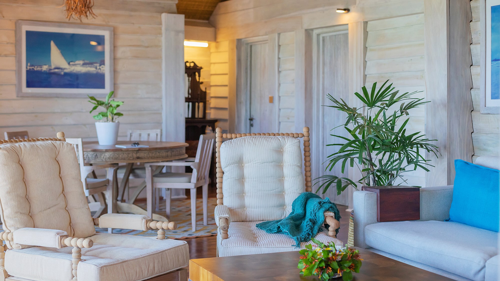 a room with chairs and a table