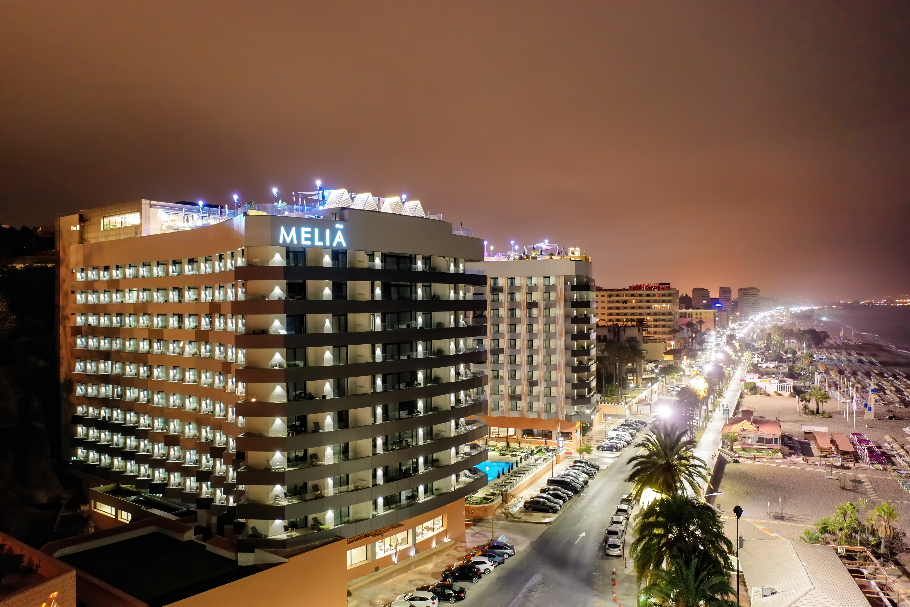 a city street with cars and buildings
