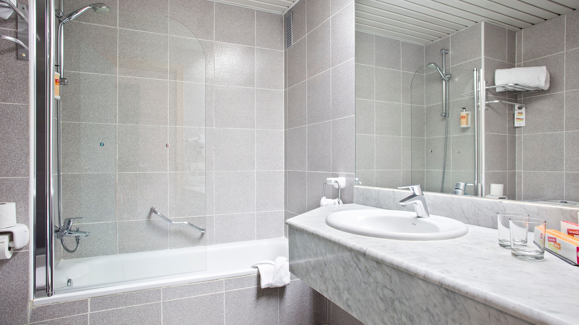 a bathroom with a sink and a shower