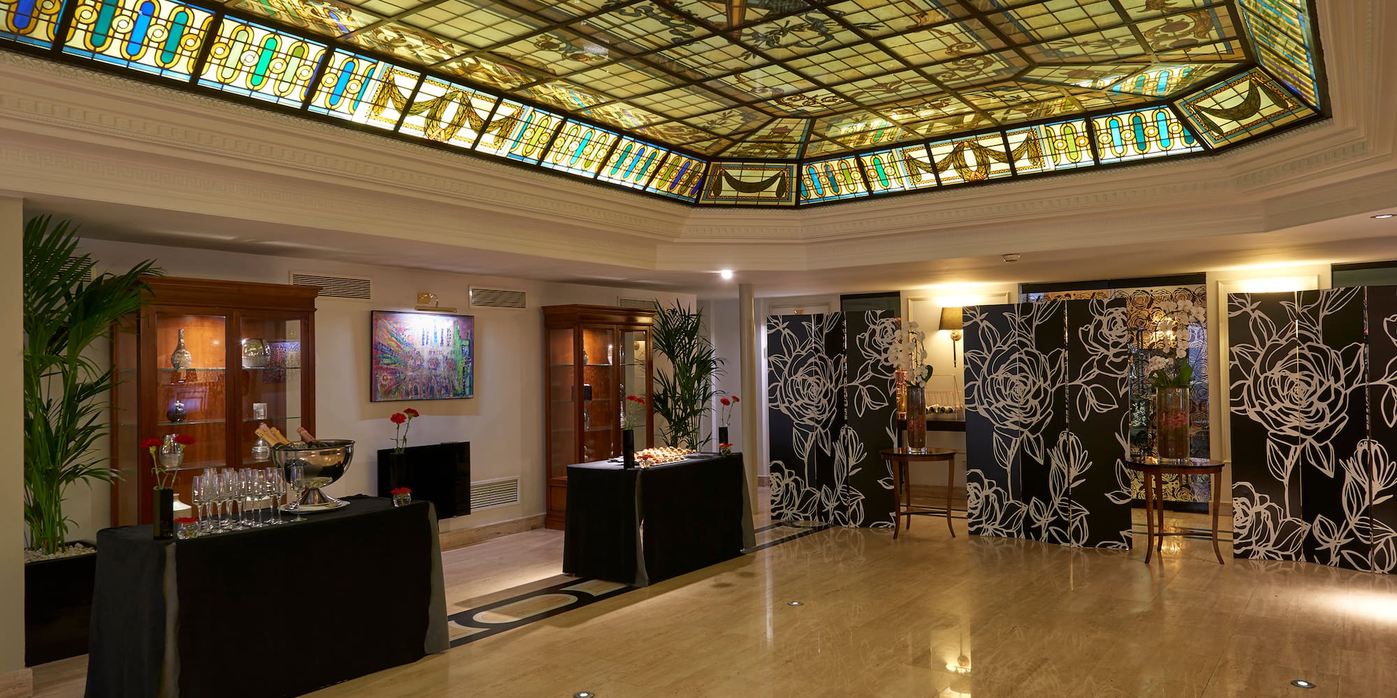 a room with stained glass ceiling