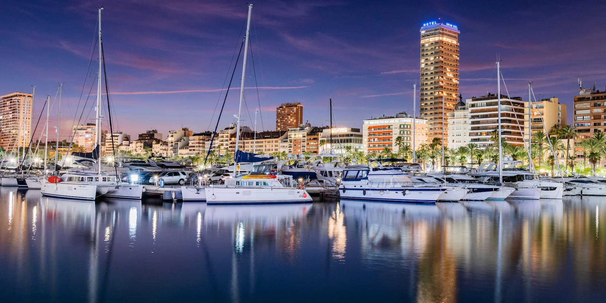 a group of boats in a harbor