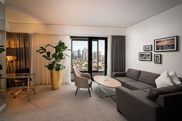 a living room with a couch and a table