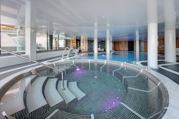 a pool with water pouring out of it