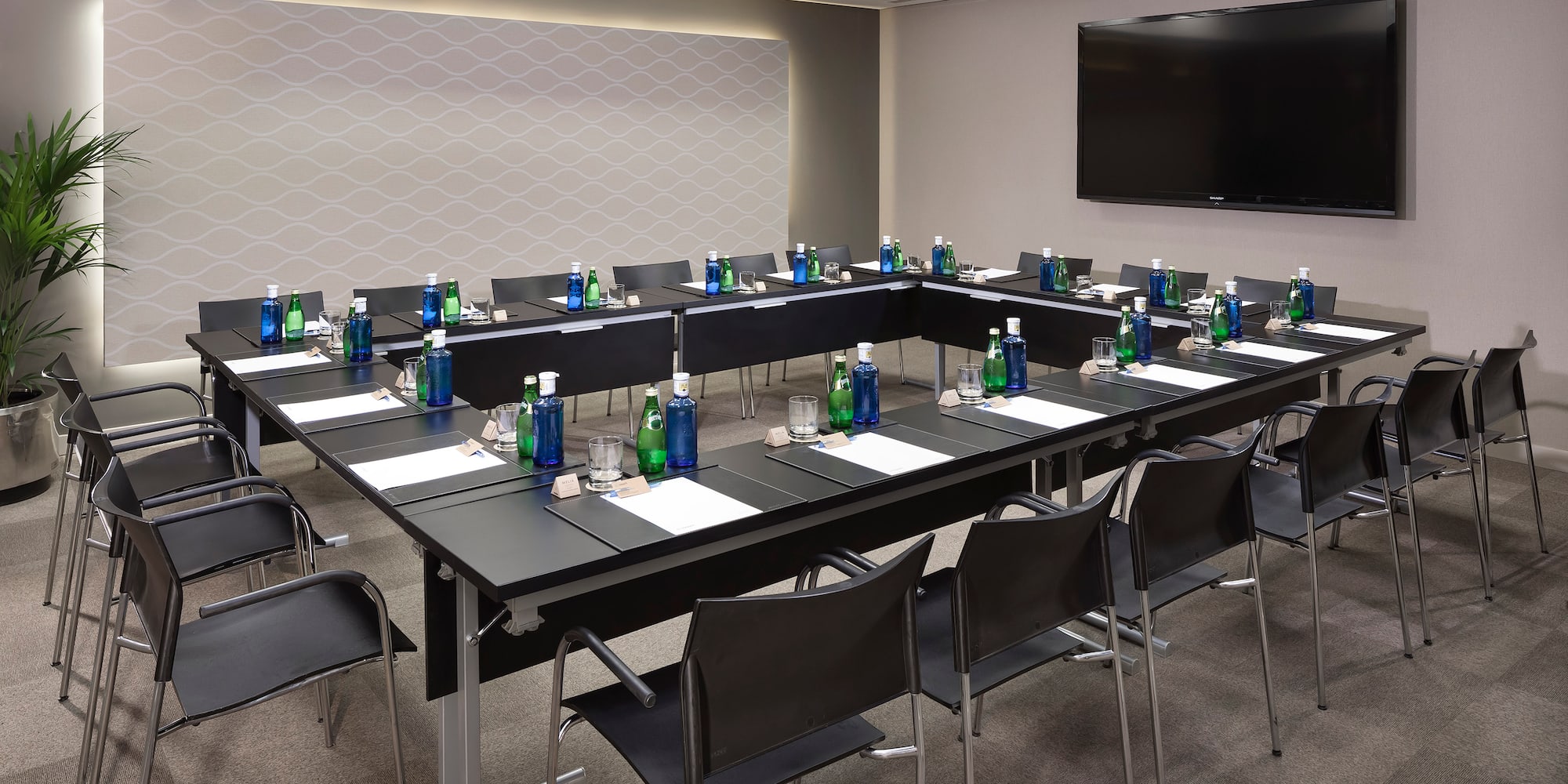 a room with tables and chairs