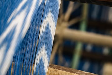 a close up of a blue and white fabric