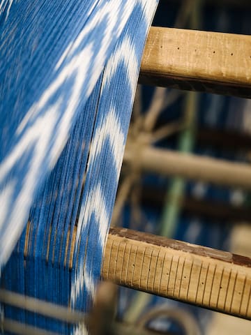 a close up of a blue and white fabric