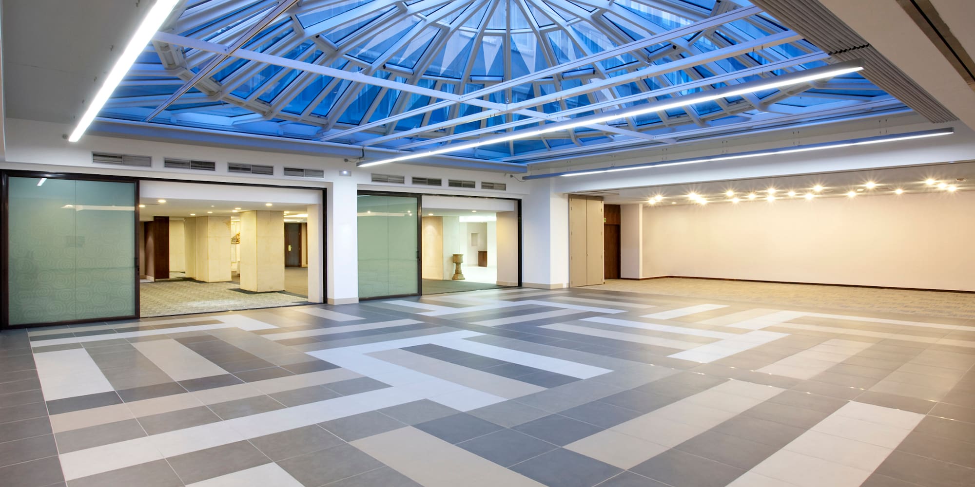 a large room with glass ceiling