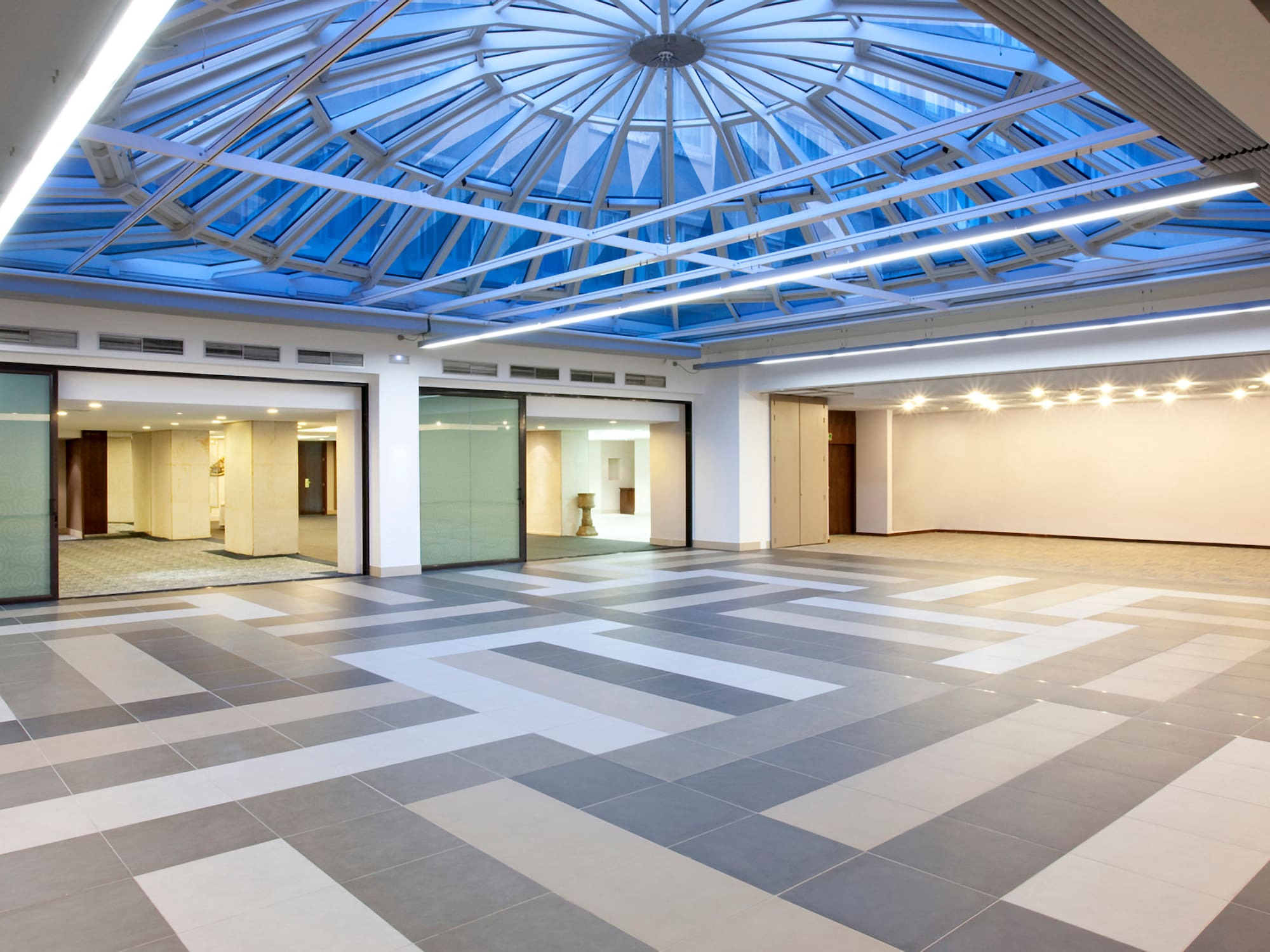 a large room with glass ceiling