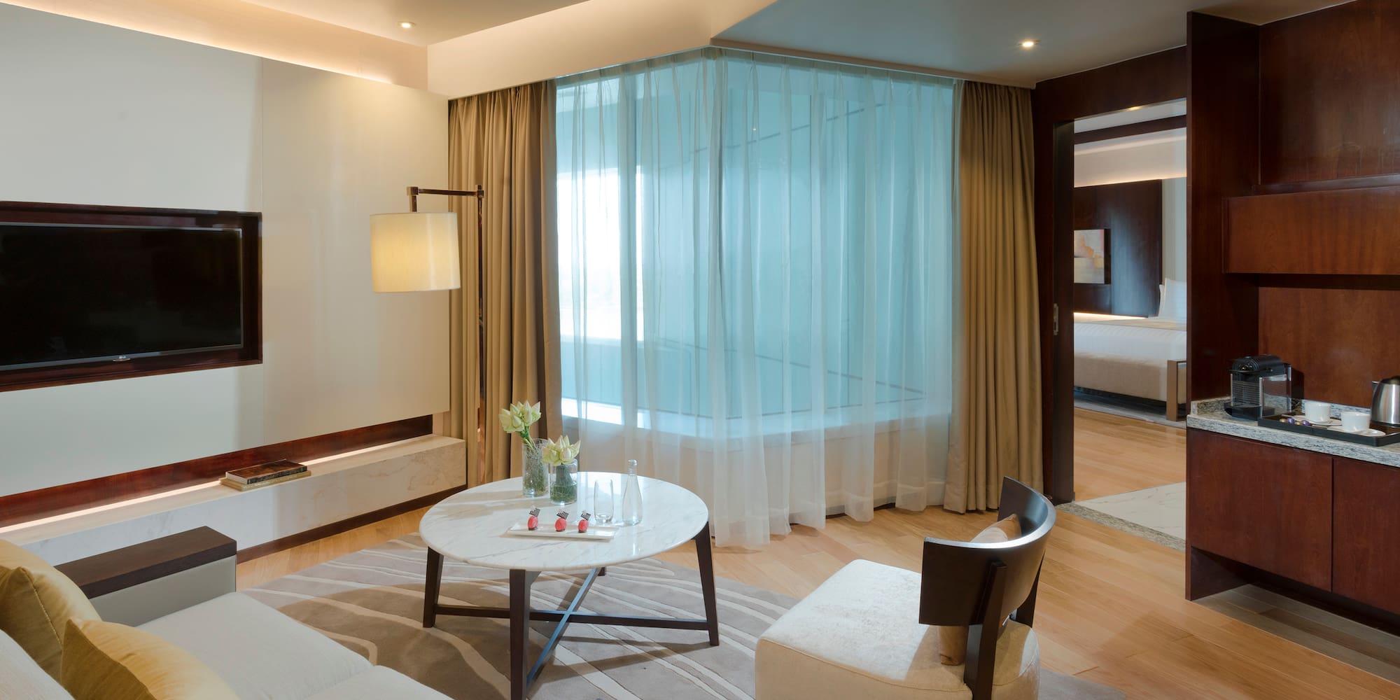 a room with a table and chairs