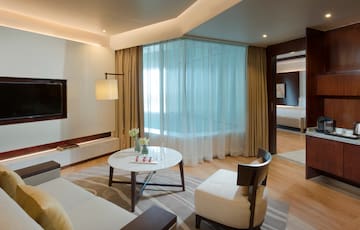 a room with a table and chairs