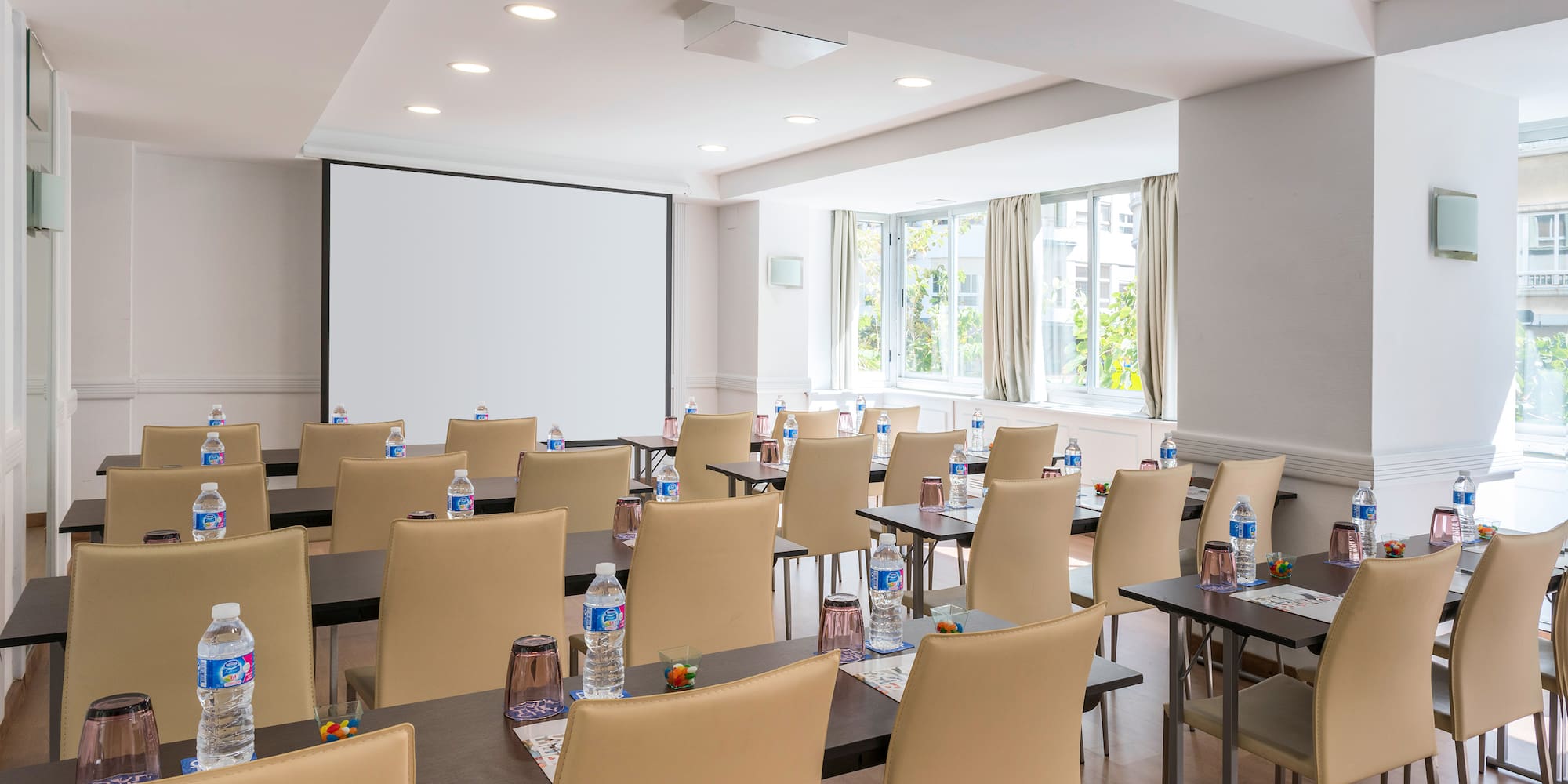 a room with tables and chairs