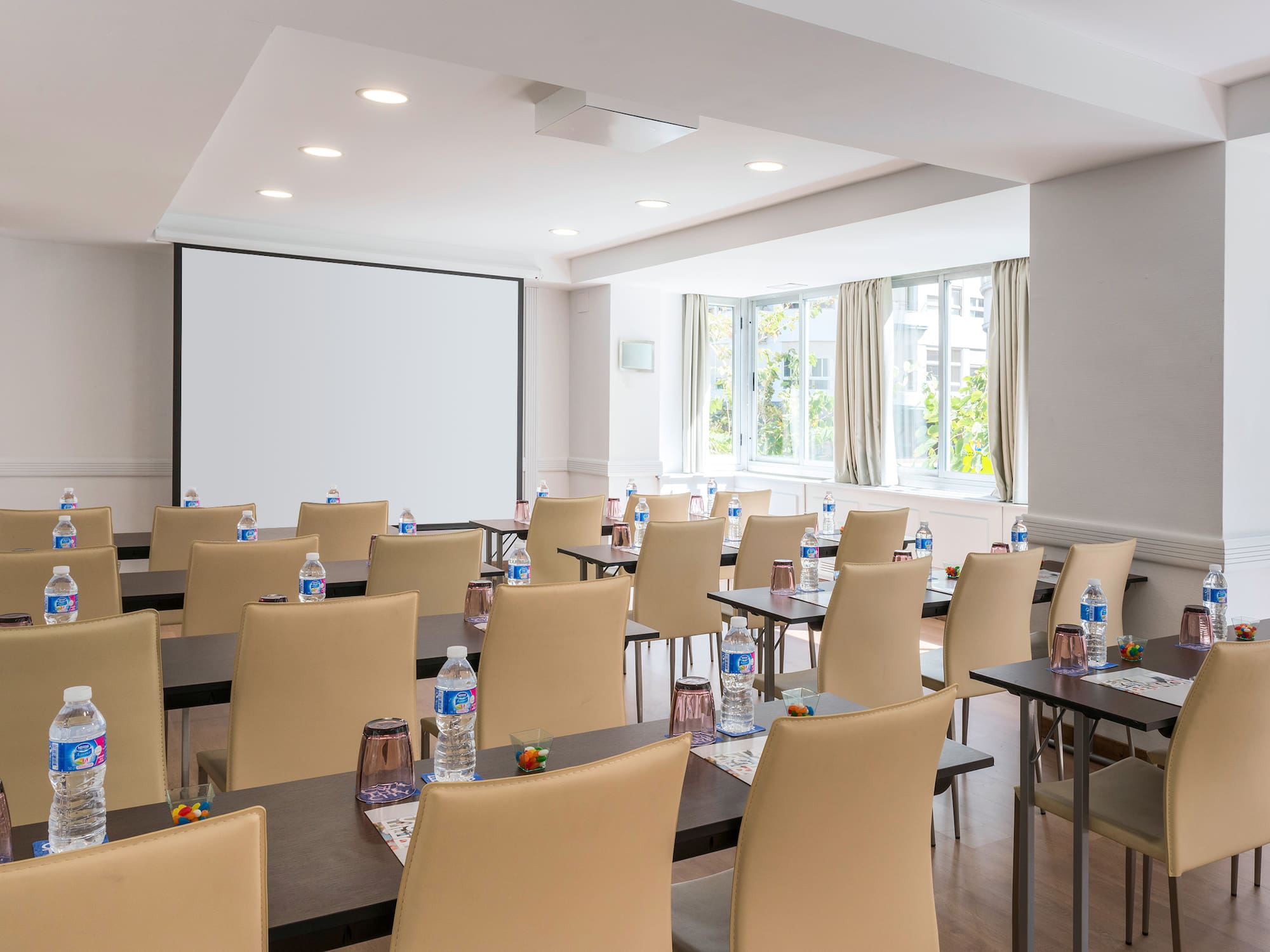 a room with tables and chairs