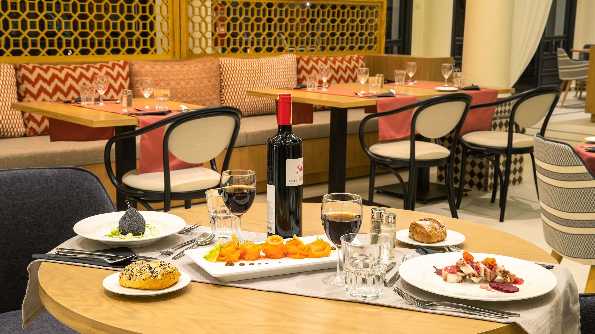 a table with food and wine on it