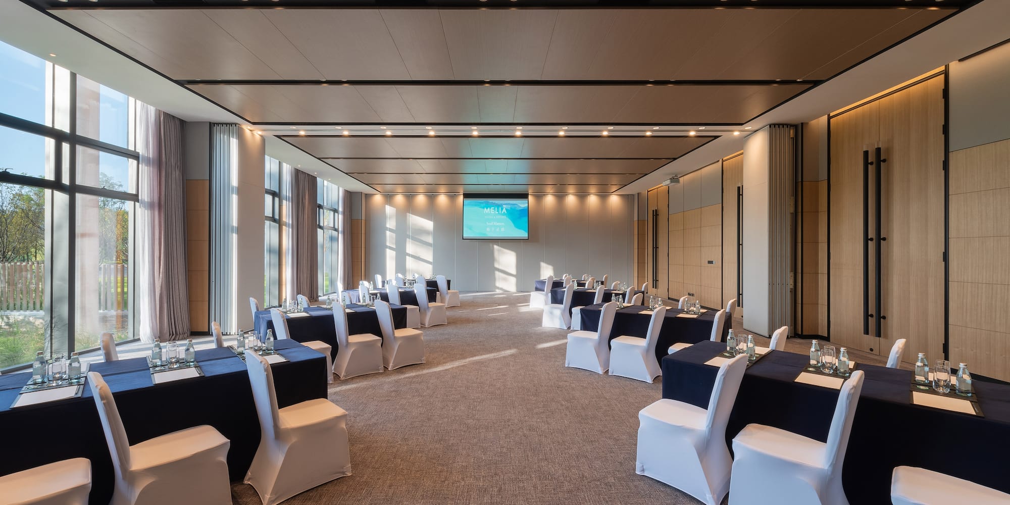 a room with tables and chairs