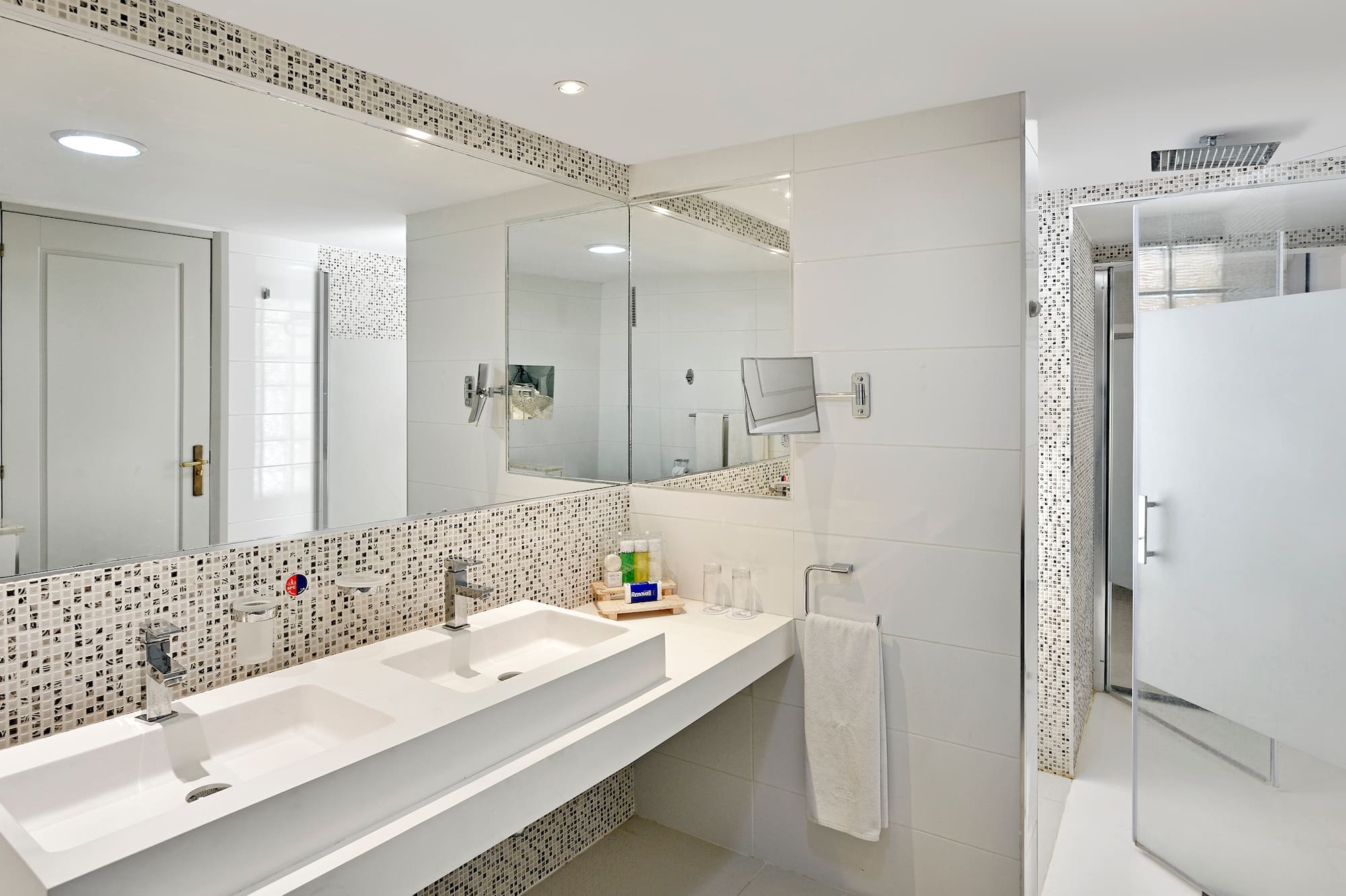 a bathroom with a mirror and sink