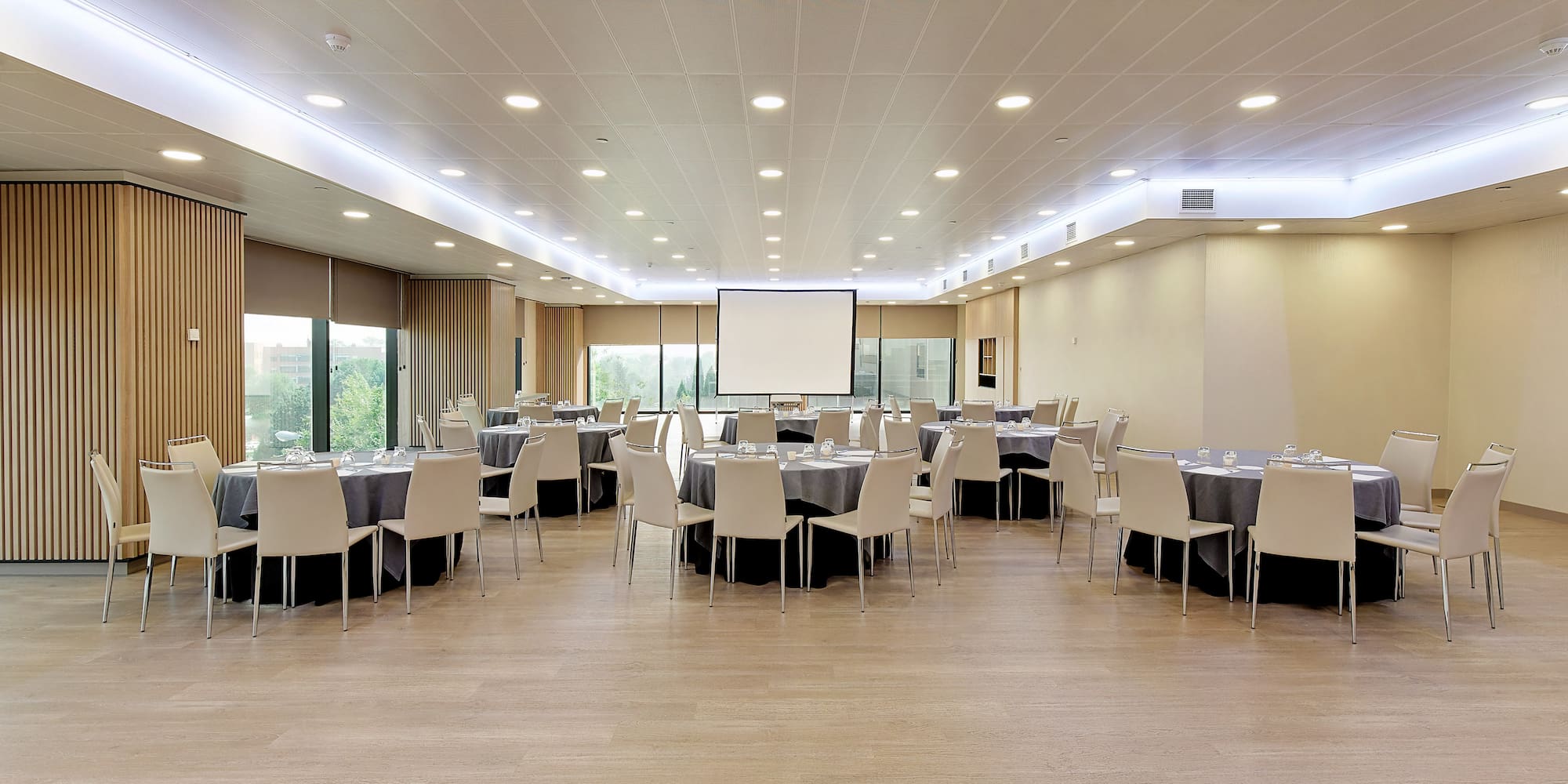 a room with tables and chairs