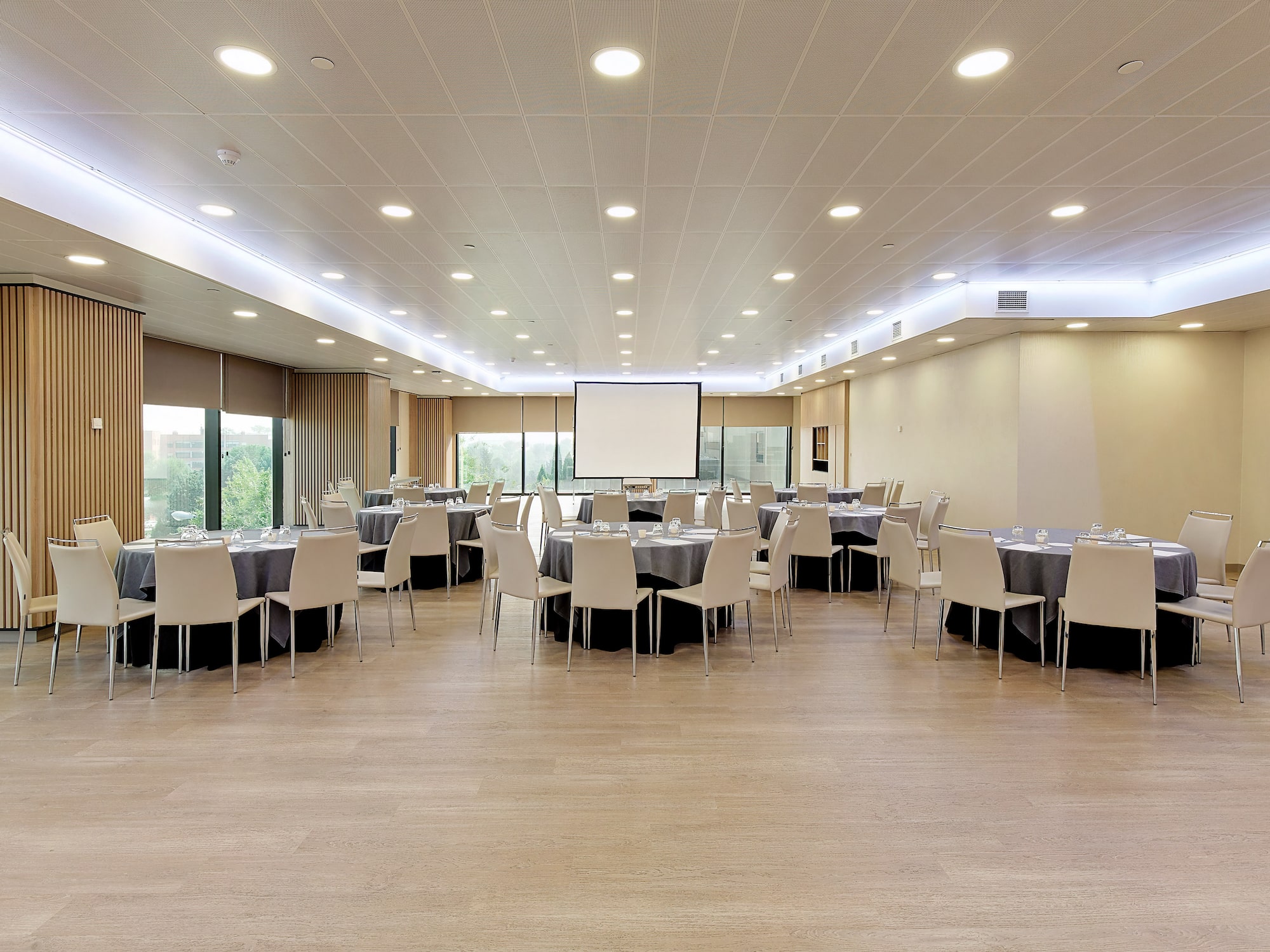 a room with tables and chairs