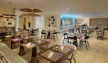 a room with tables and chairs