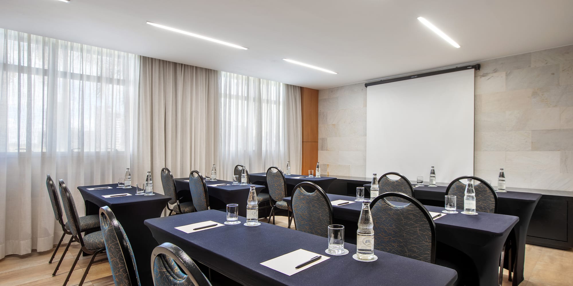 a room with tables and chairs