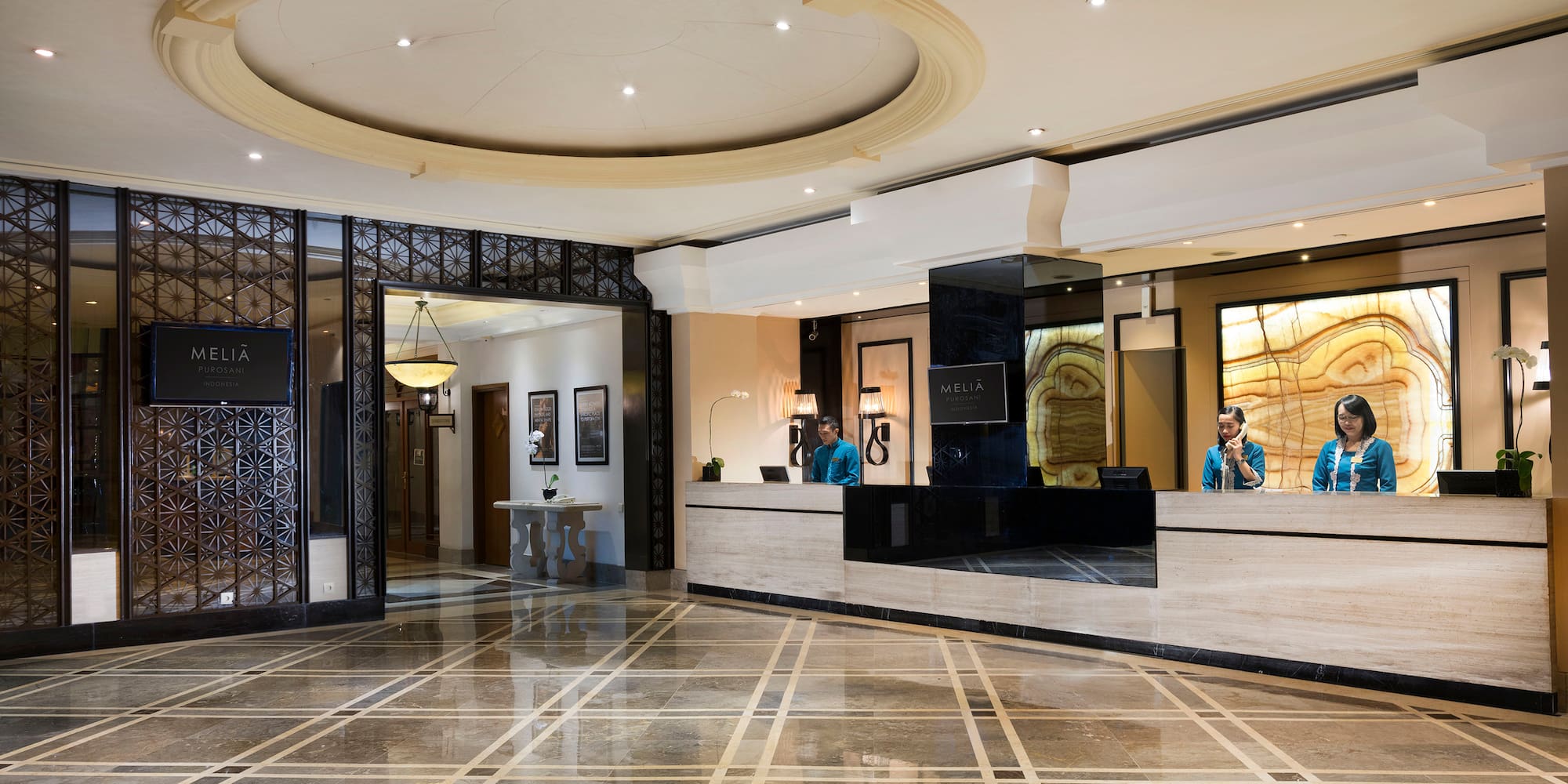 a lobby with a marble floor and a marble floor