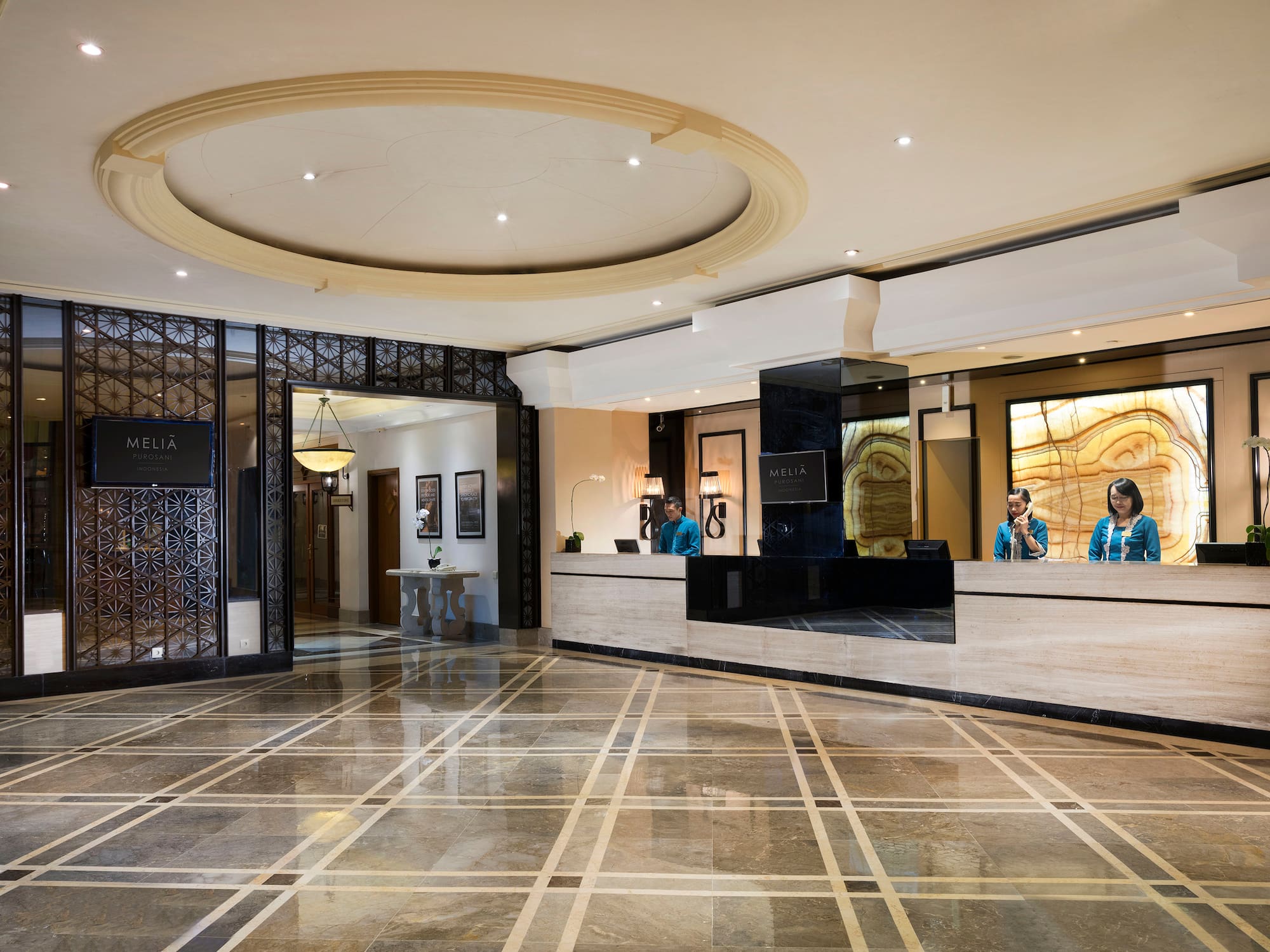 a lobby with a marble floor and a marble floor