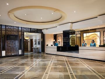 a lobby with a marble floor and a marble floor