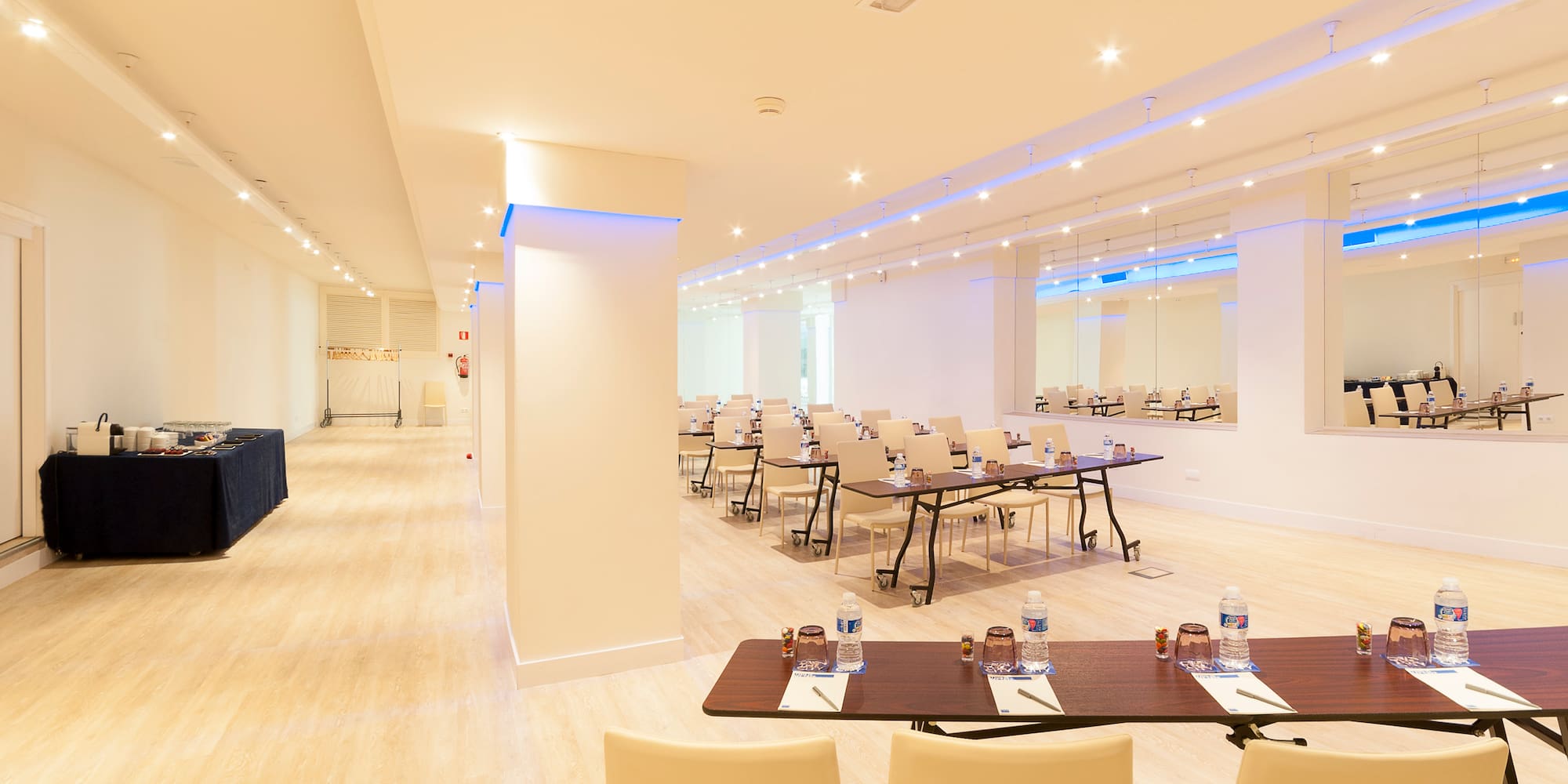 a room with tables and chairs