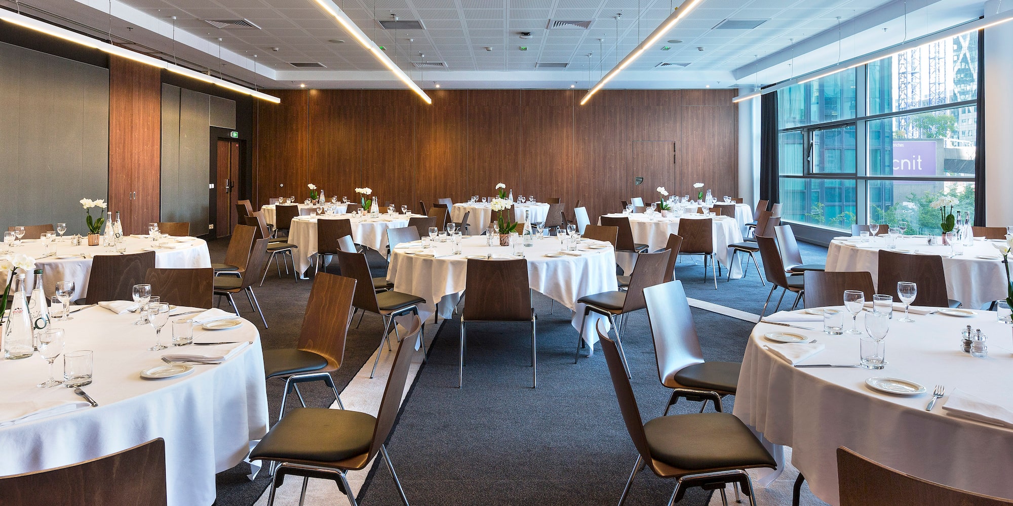 a room with tables and chairs