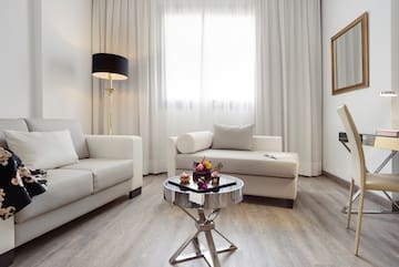 a living room with couches and a table
