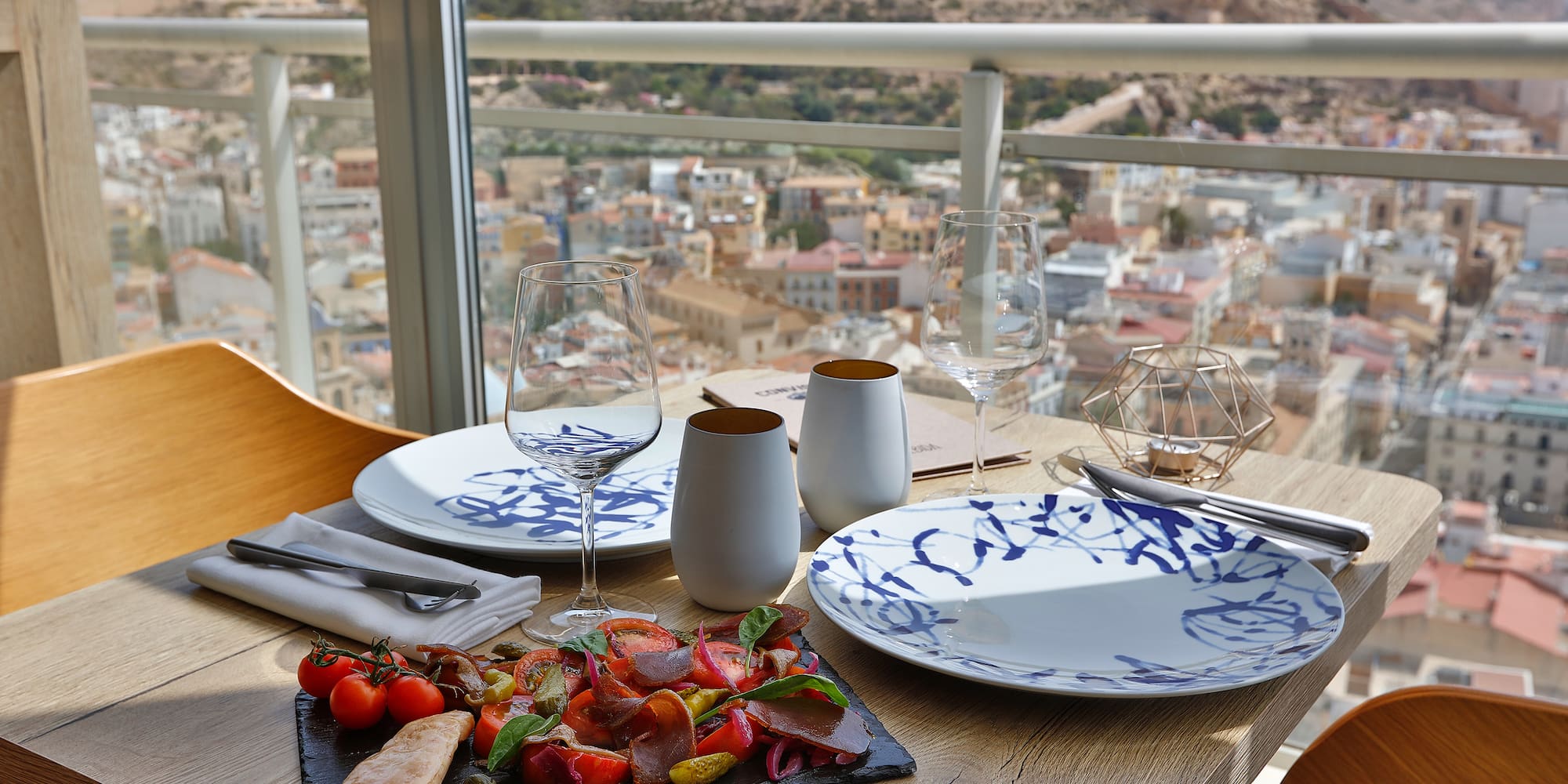 a table with plates and glasses on it