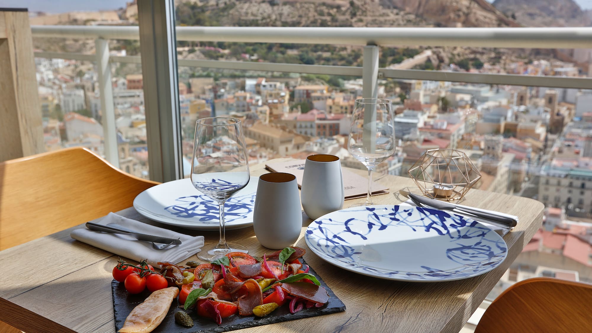a table with plates and glasses on it