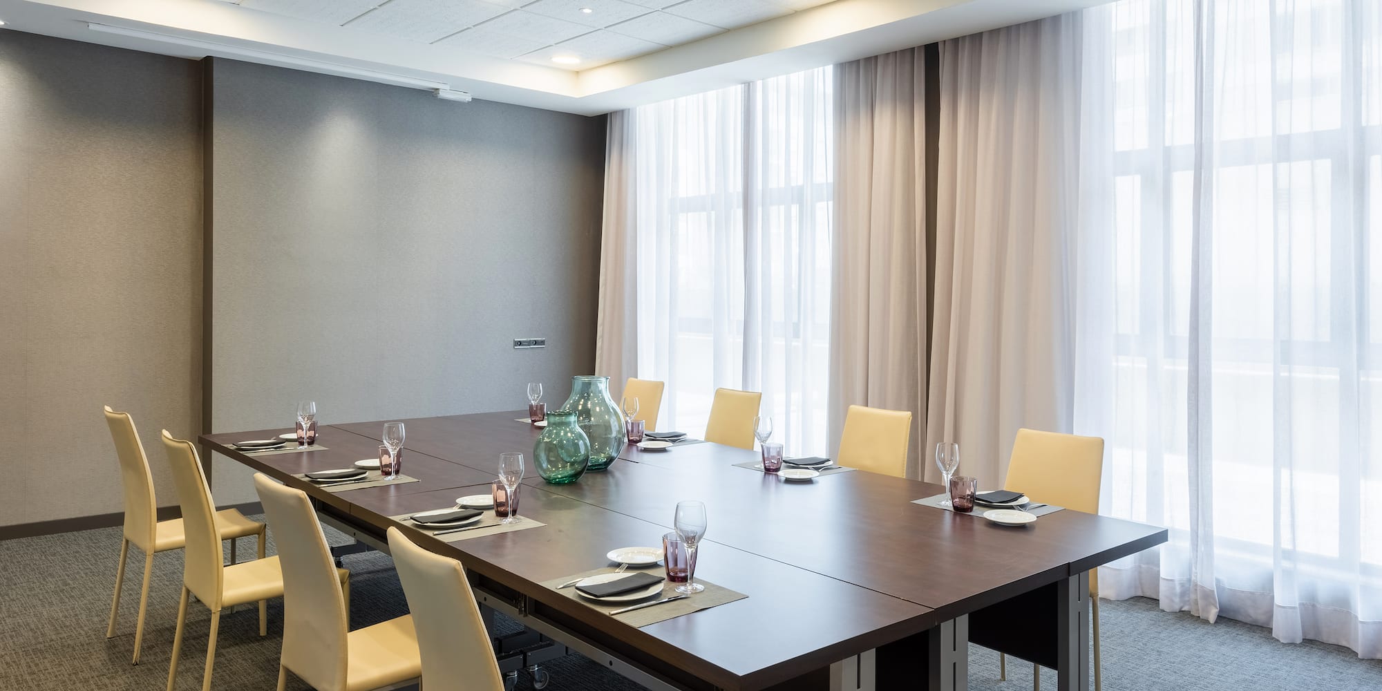 a room with a table and chairs