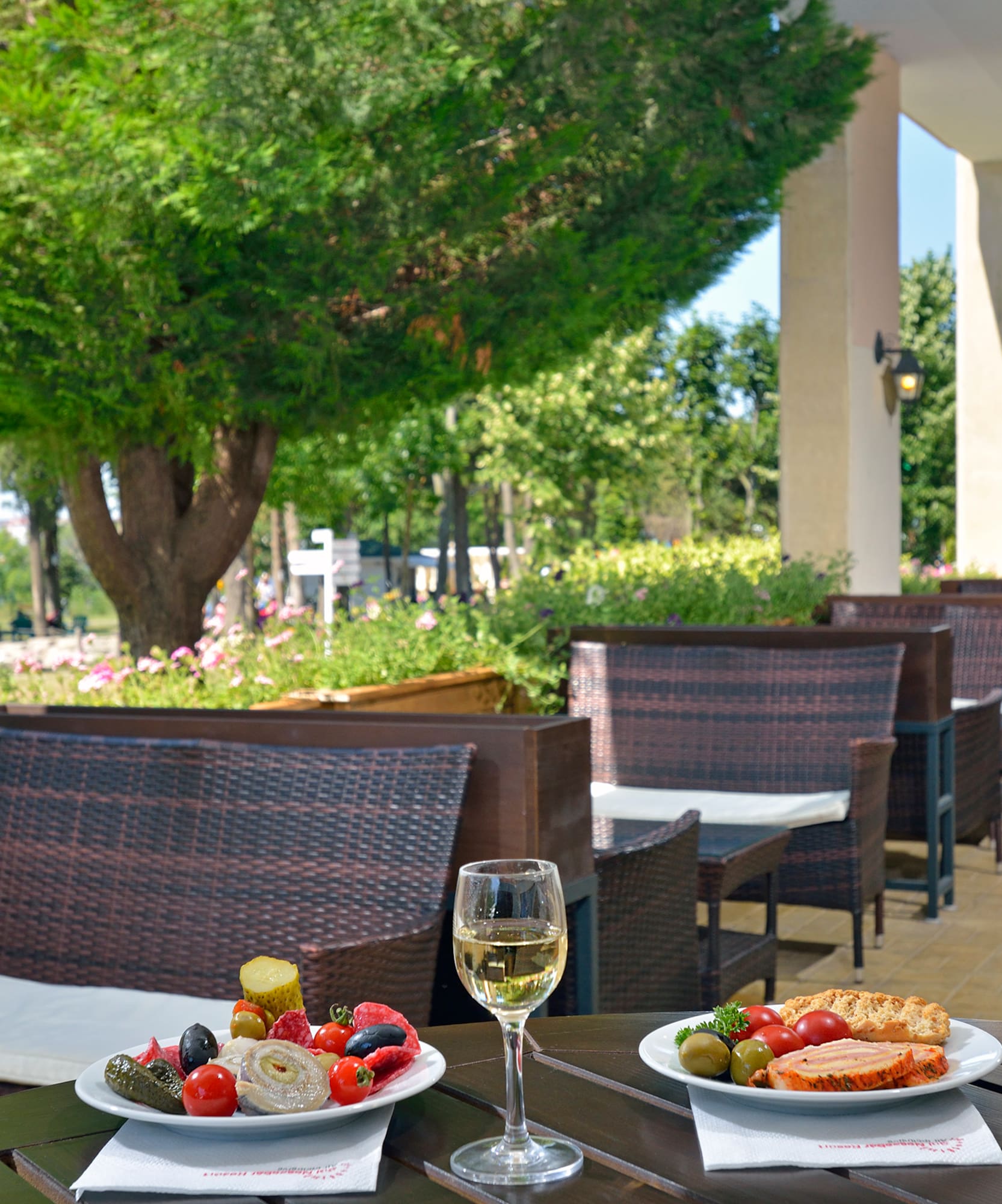 a table with food and wine glasses on it
