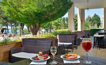 a table with food and wine glasses on it
