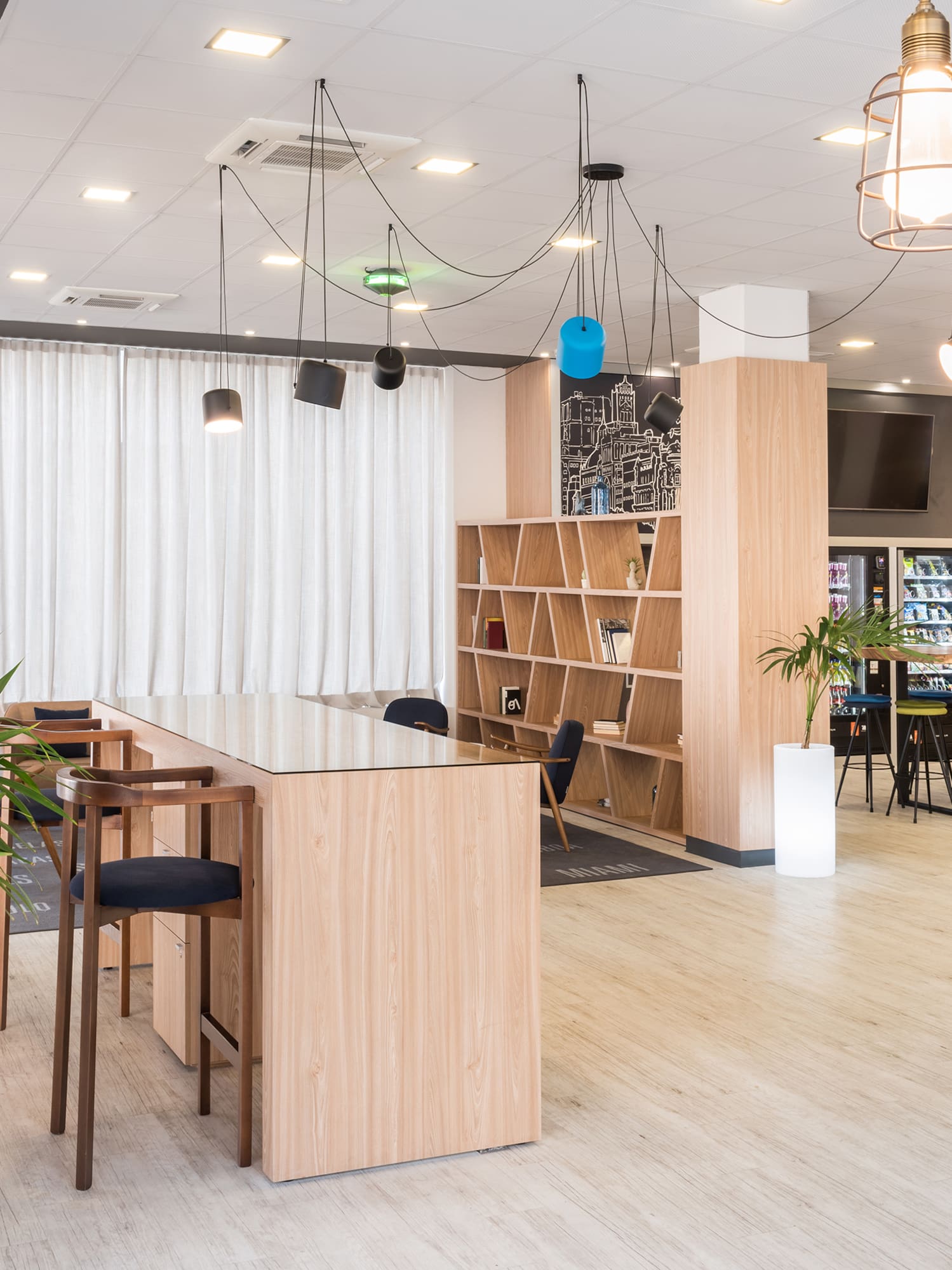 a room with a table and chairs