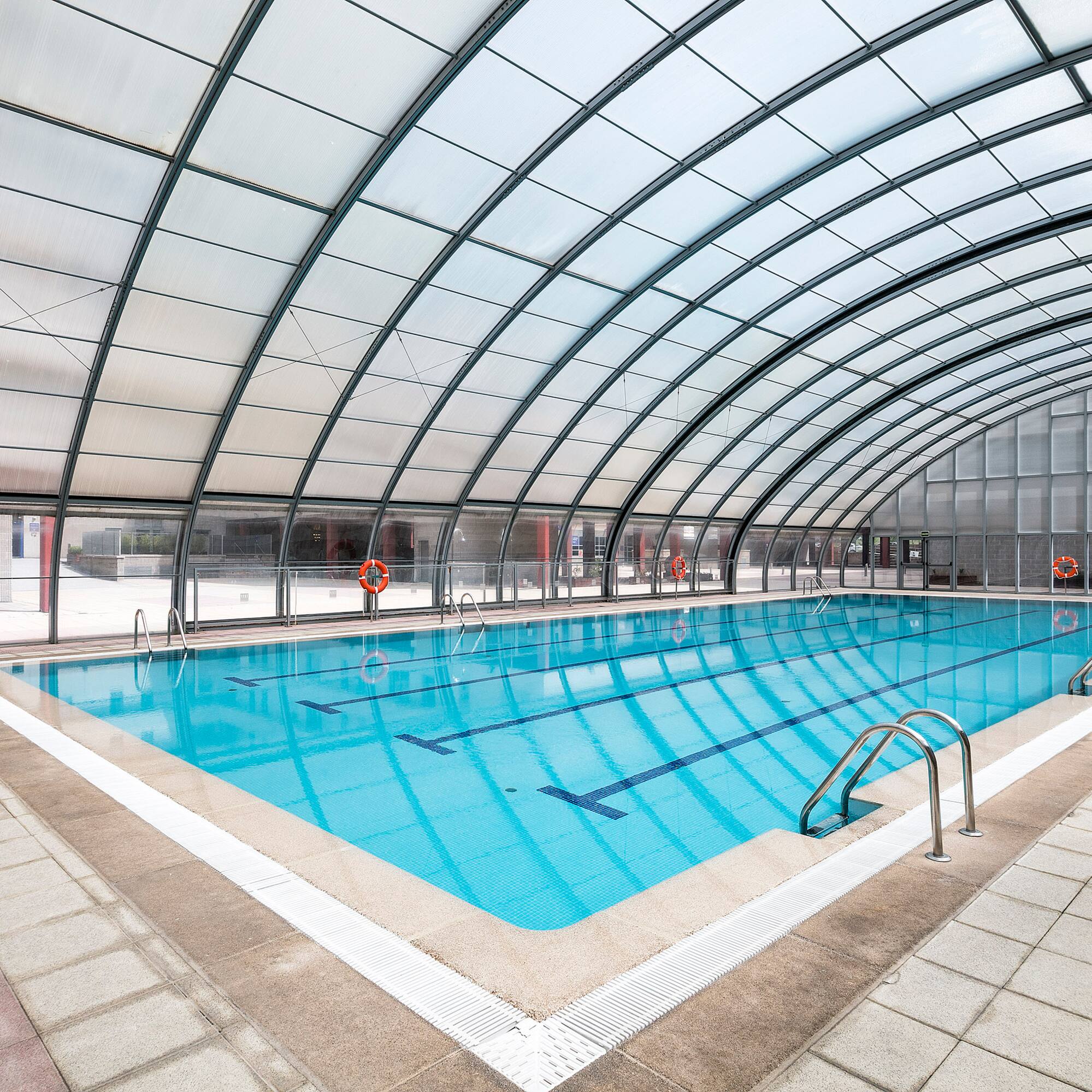 a swimming pool inside a building