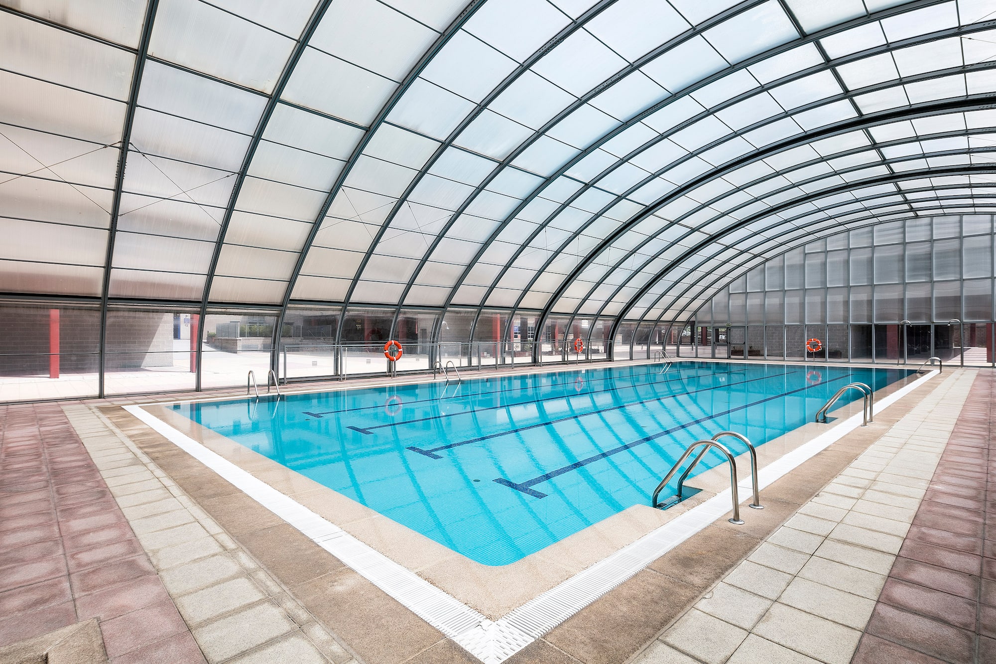 a swimming pool inside a building
