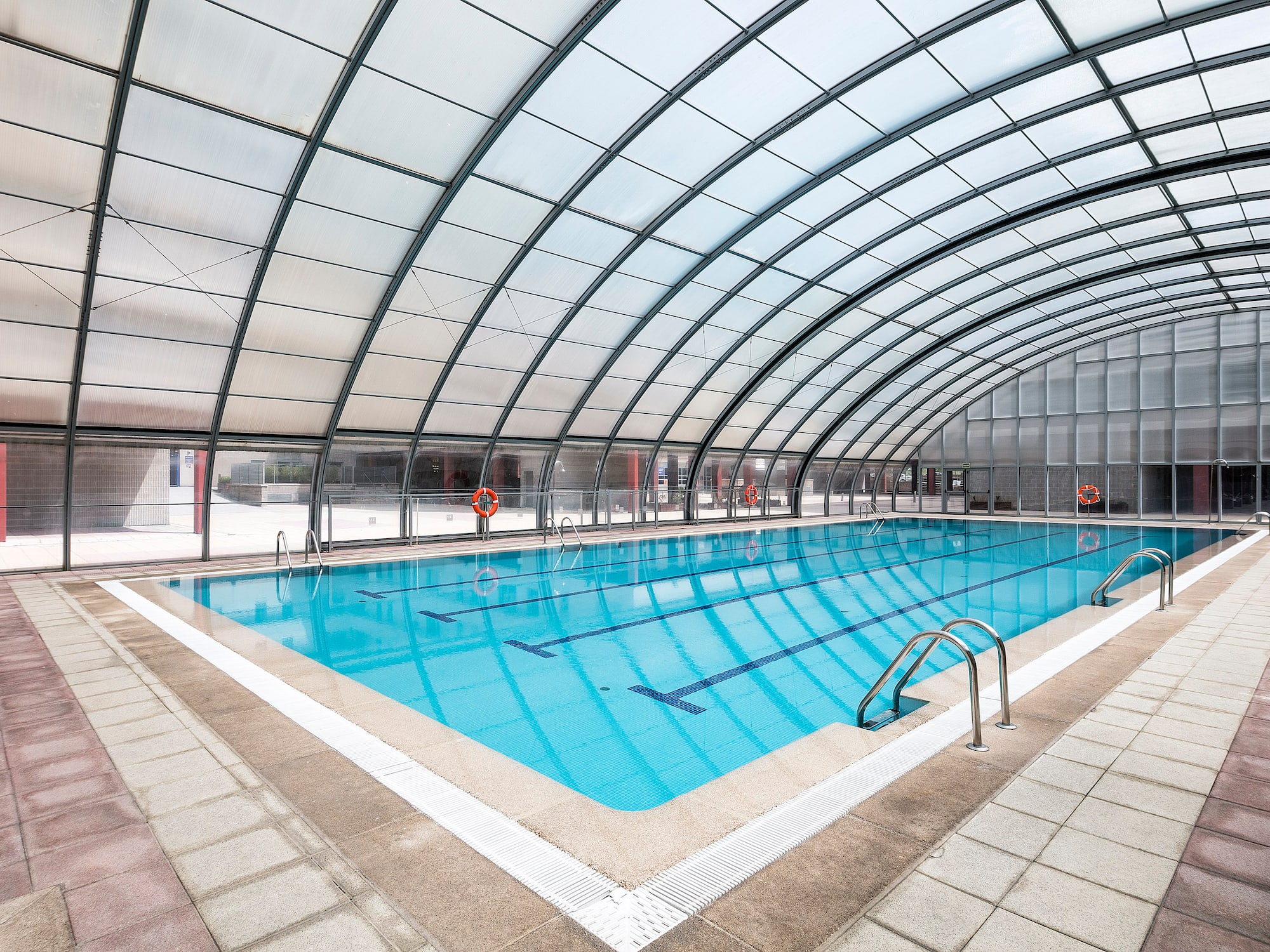 a swimming pool inside a building
