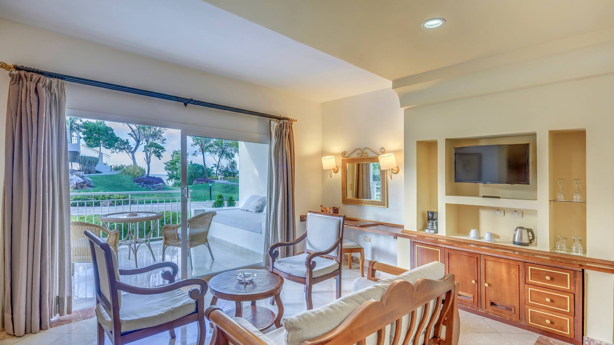 a room with a television and a television set