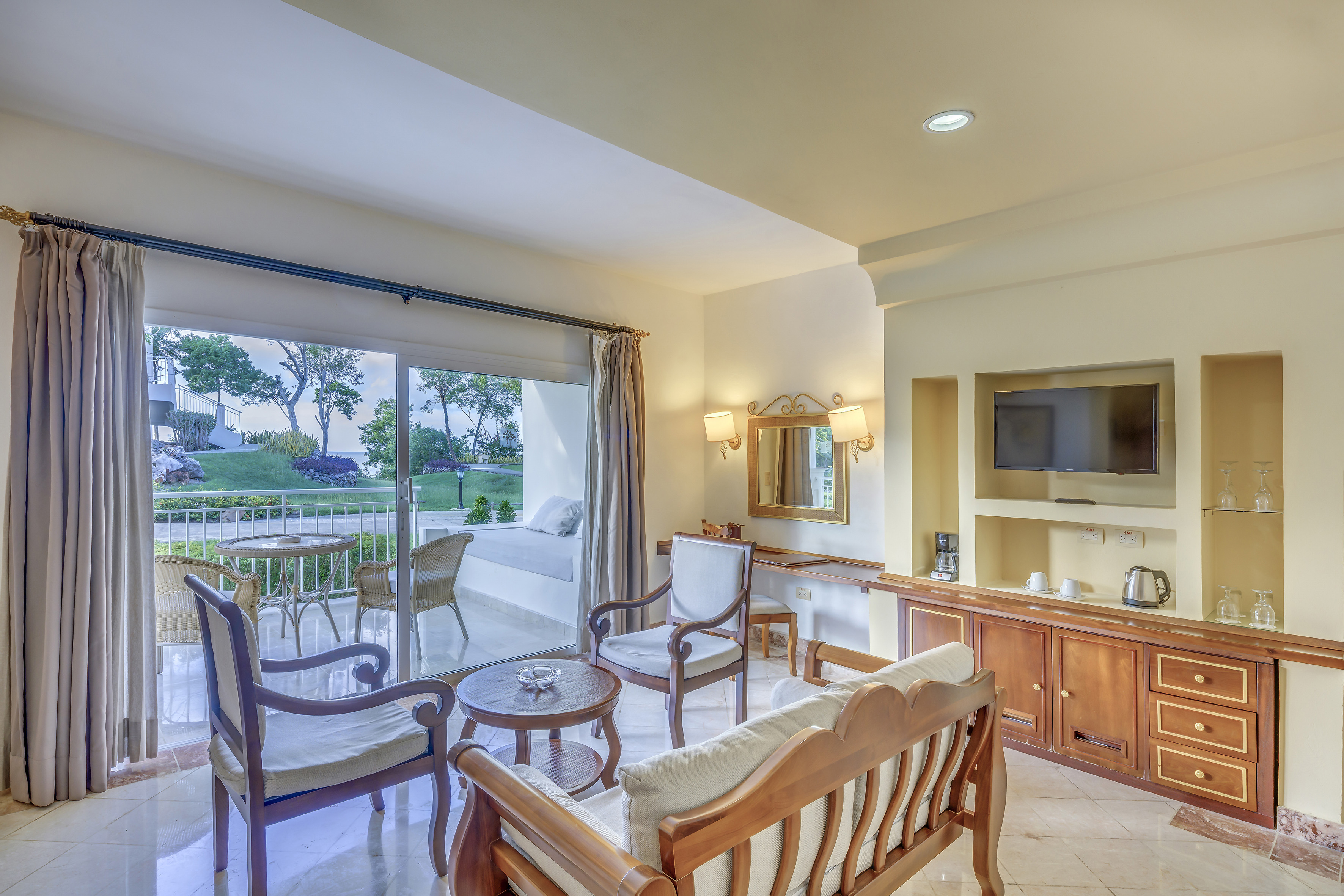 a room with a television and a television set