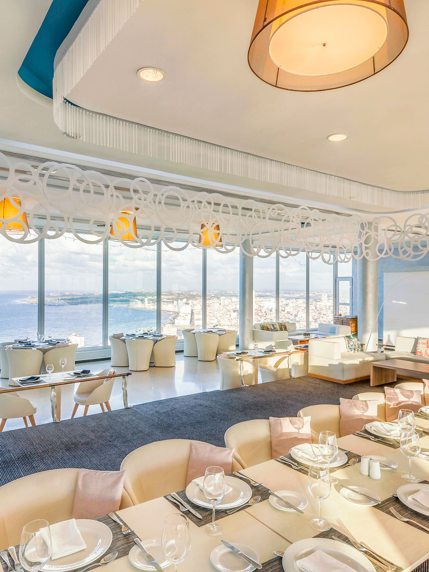 a large room with tables and chairs