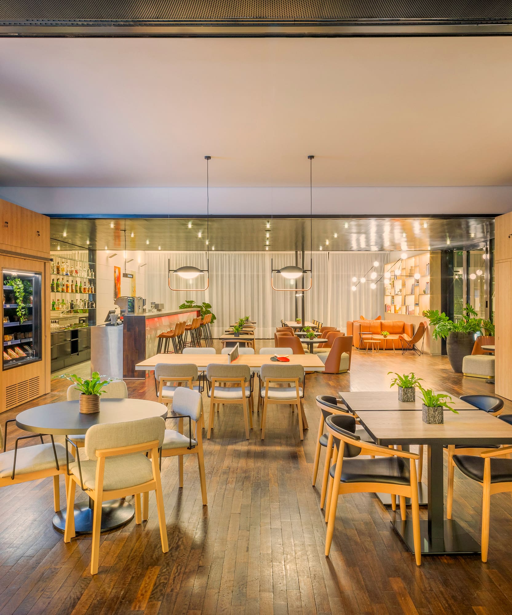 a room with tables and chairs