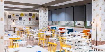 a room with tables and chairs