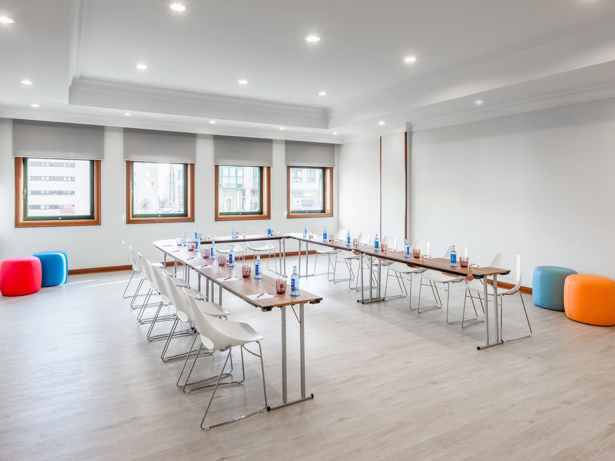 a room with tables and chairs