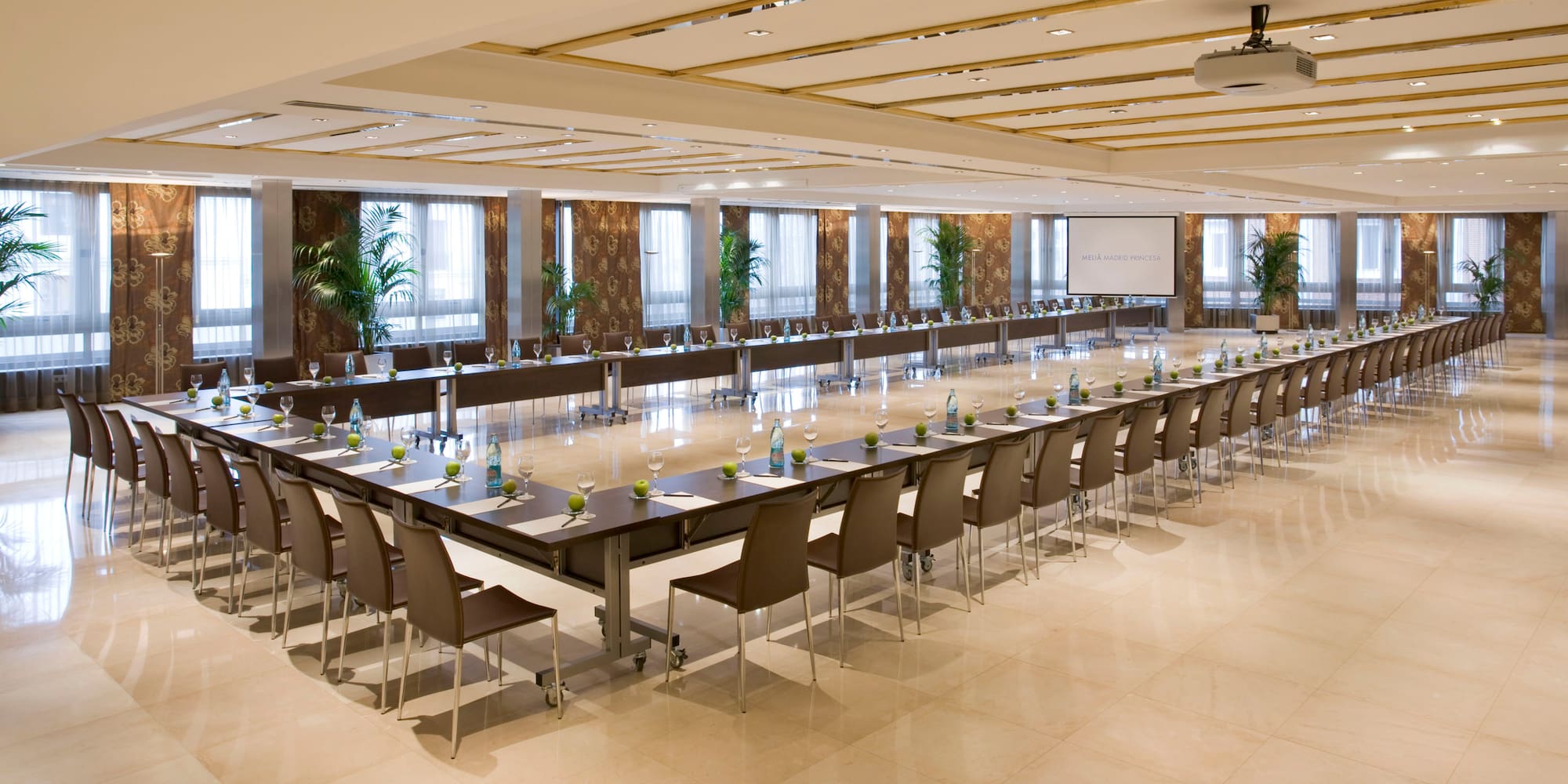 long room with tables and chairs