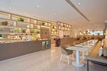 a restaurant with tables and chairs