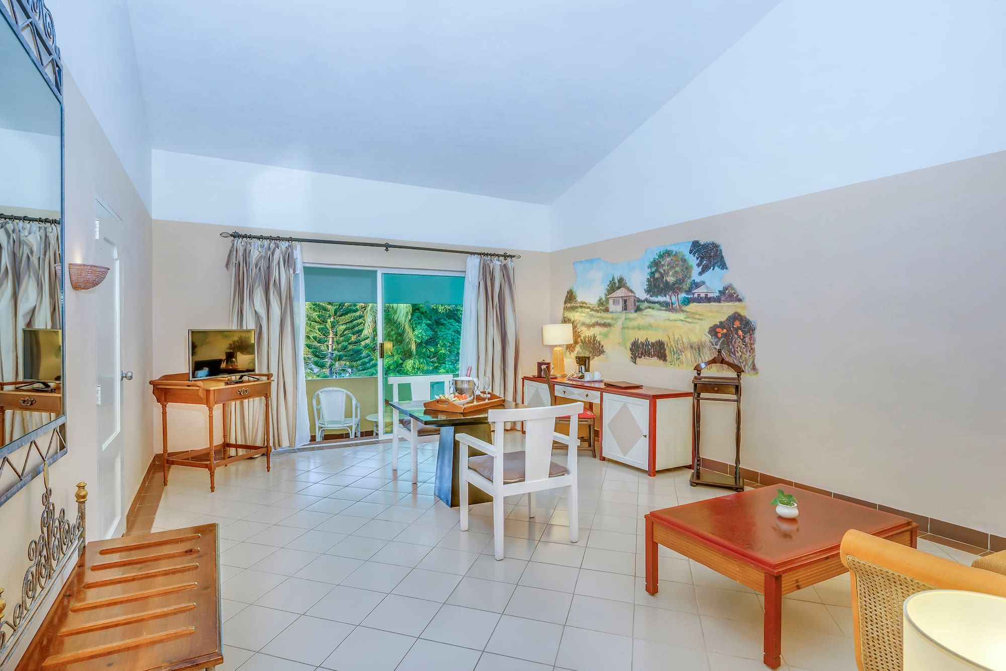 a room with a table and chairs