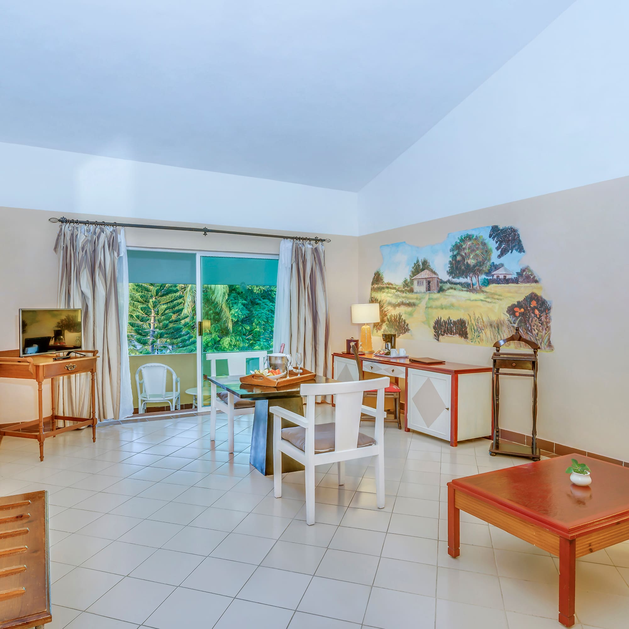 a room with a table and chairs